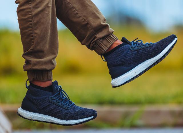 feet in navy sneakers
