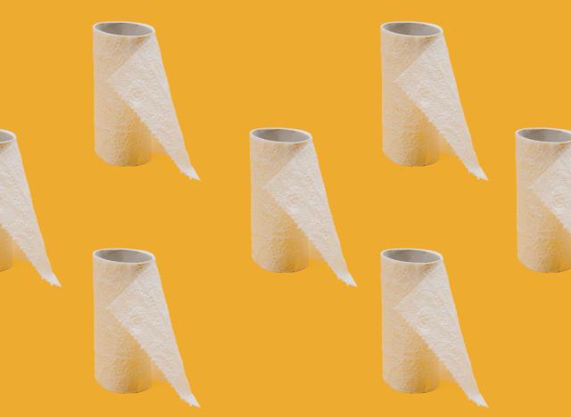 toilet paper rolls on an orange background