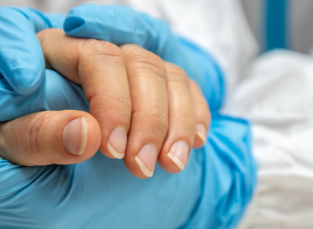 hands holding for covid recovery
