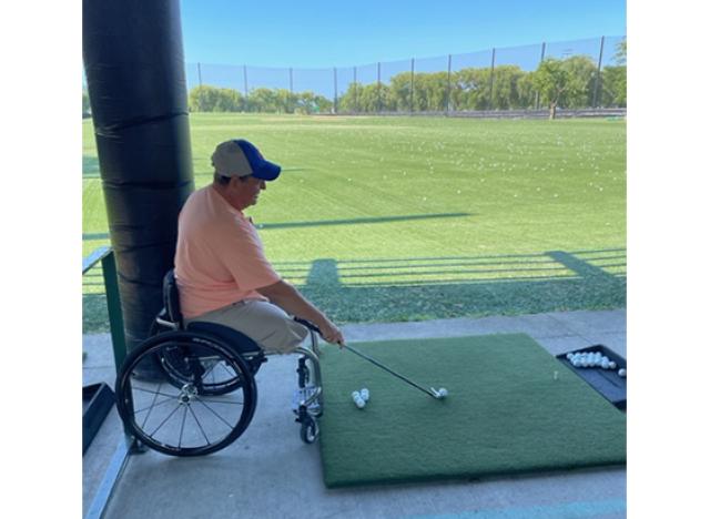 An adaptive golfer tees off