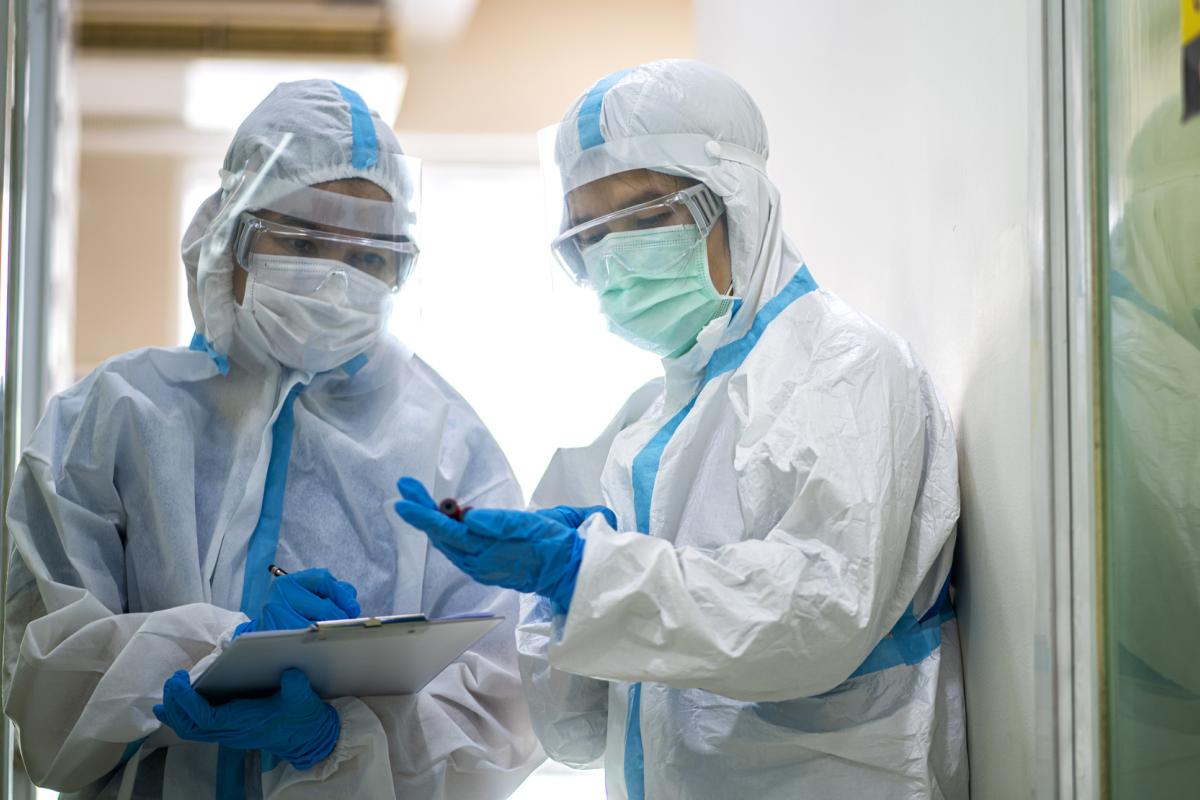 Two healthcare workers in PPE