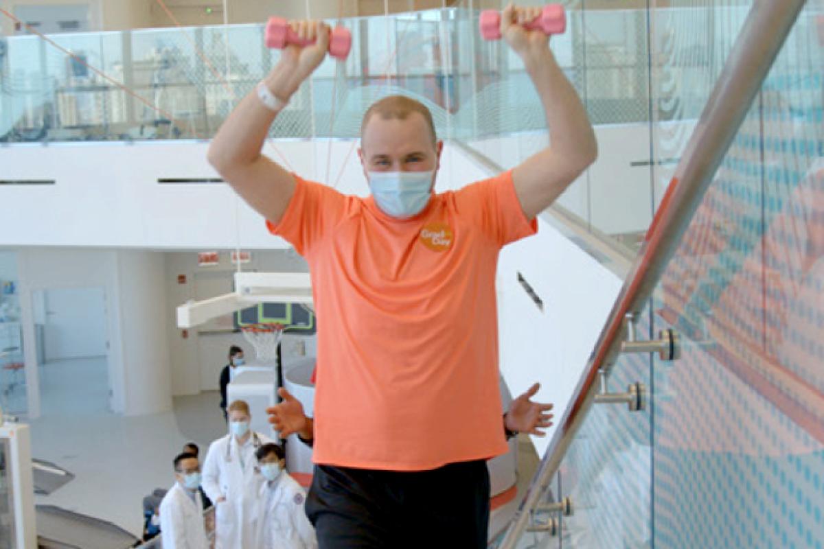John walking again after multiple brain and spinal cord injuries