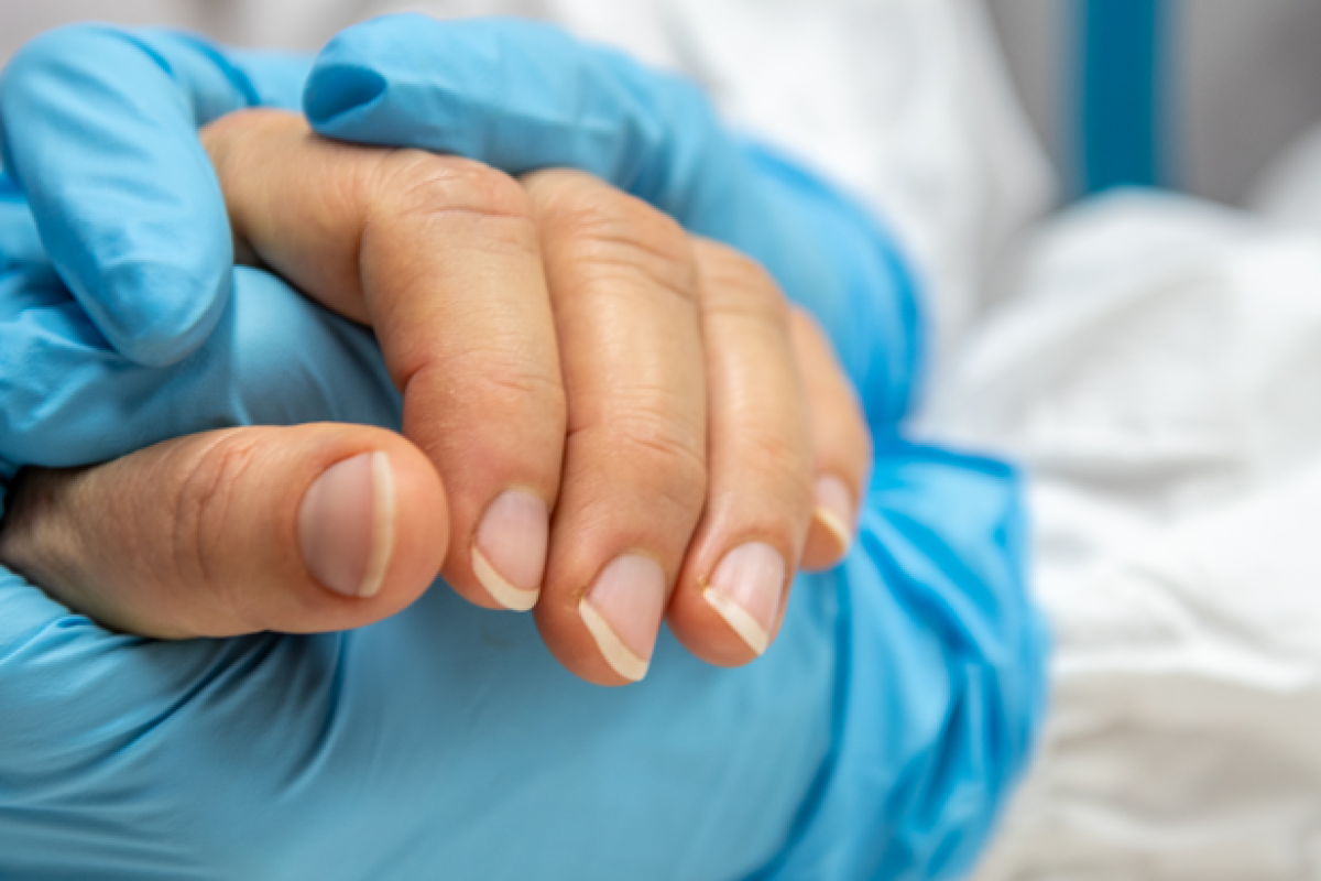hands holding for covid recovery