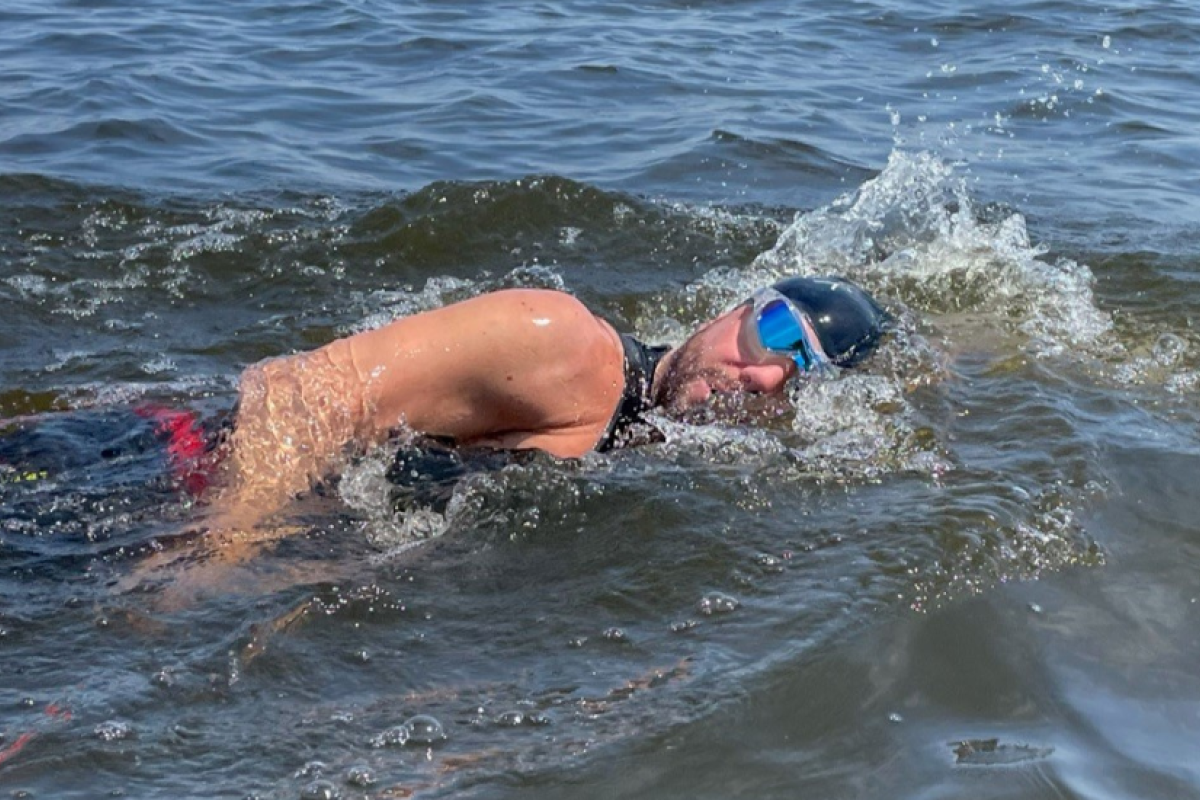 Rob Heitz swimming in Lake Michigan