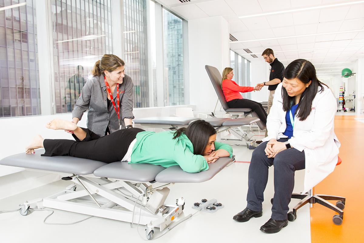 Dr. Rho with a patient