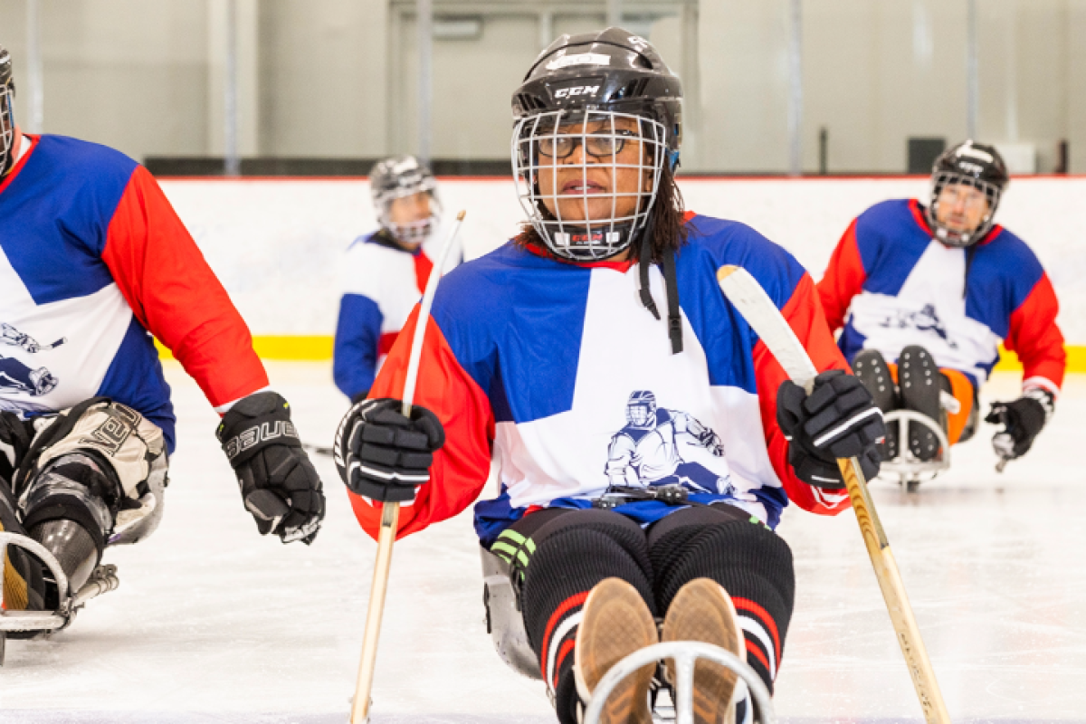 sled hockey player on the ice