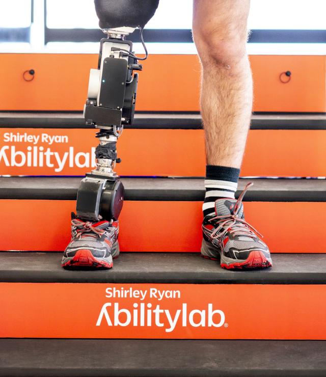 Man standing with powered leg