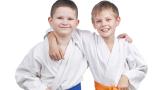 Two children taking karate classes