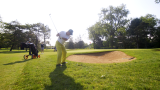man golfing