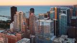 Shirley Ryan AbilityLab visible within the Chicago skyline during sunset.