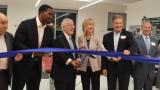 Joanne C. Smith, MD, president and CEO of Shirley Ryan AbilityLab,  Homewood Mayor Rich Hofeld and Illinois State Senator Napoleon B. Harris, and others cut the ribbon at the new Homewood DayRehab Center