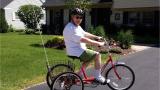 Walter Mason on a bike as he rejoins his community after stroke