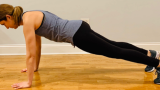 Therapist demonstrating correct push-up form