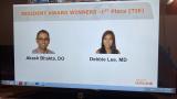 Screenshot of a ZOOM presentation, awarding a 1st place tie to Dr Debbie Lee & Dr. Akash Bhakta
