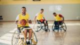 Men playing basketball and using wheelchairs