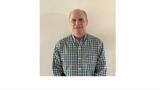 Color photo of Kevin Fearn, a middle aged white mad in a checkered shirt