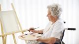 Art therapy patient uses oil paints