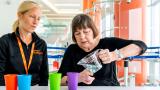 therapist and patient doing fine motor therapy with hands and arms